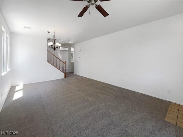8253 Pearl Oasis Ct, Las Vegas, NV 89139 - unfurnished living room with ceiling fan, carpet floors, a chandelier, and stairs