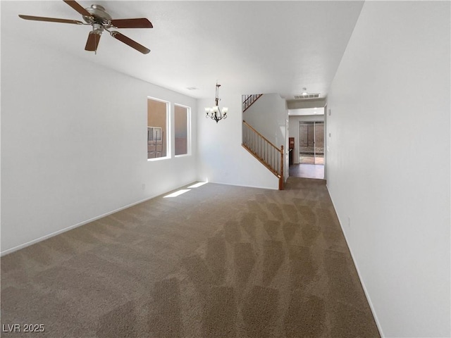 8253 Pearl Oasis Ct, Las Vegas, NV 89139 - spare room featuring carpet floors, a chandelier, a ceiling fan, and stairway