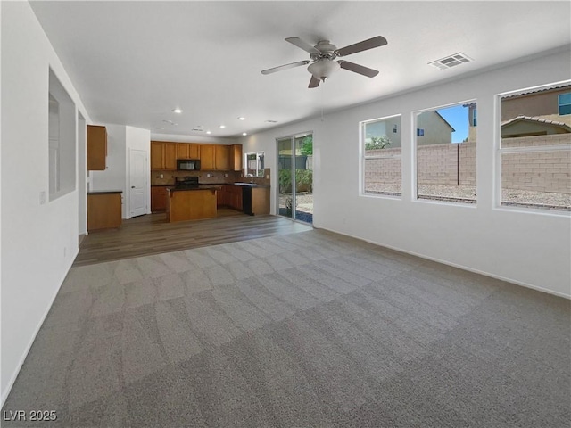 8253 Pearl Oasis Ct, Las Vegas, NV 89139 - unfurnished living room featuring a ceiling fan, carpet flooring, recessed lighting, and baseboards