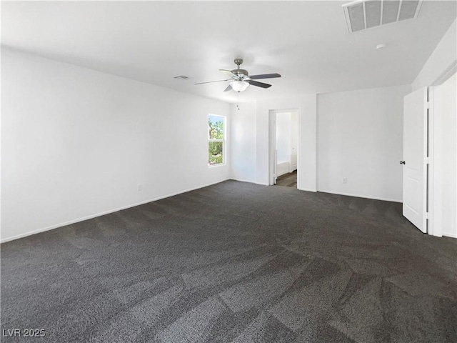 8253 Pearl Oasis Ct, Las Vegas, NV 89139 - spare room with ceiling fan, dark carpet, and baseboards