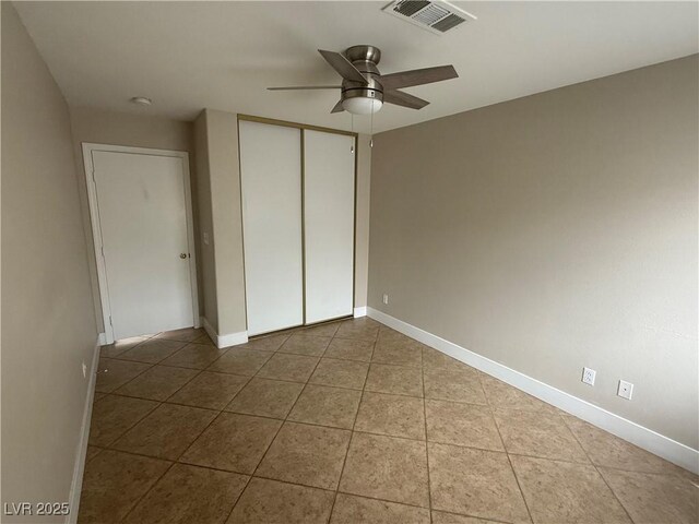 2025 Cary Grant Ct, Las Vegas, NV 89142 - unfurnished bedroom featuring a closet, tile patterned floors, and baseboards