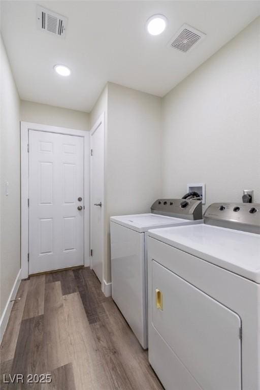 4813 Plata Del Sol, Las Vegas, NV 89121 - laundry area featuring independent washer and dryer, light wood-type flooring, baseboards, and recessed lighting