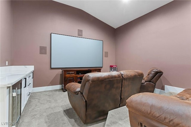 2309 Prometheus Ct, Henderson, NV 89074 - home theater featuring lofted ceiling, baseboards, and light colored carpet