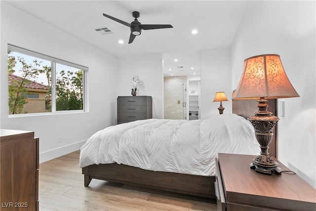 2309 Prometheus Ct, Henderson, NV 89074 - bedroom featuring recessed lighting, wood finished floors, baseboards, ensuite bath, and ceiling fan