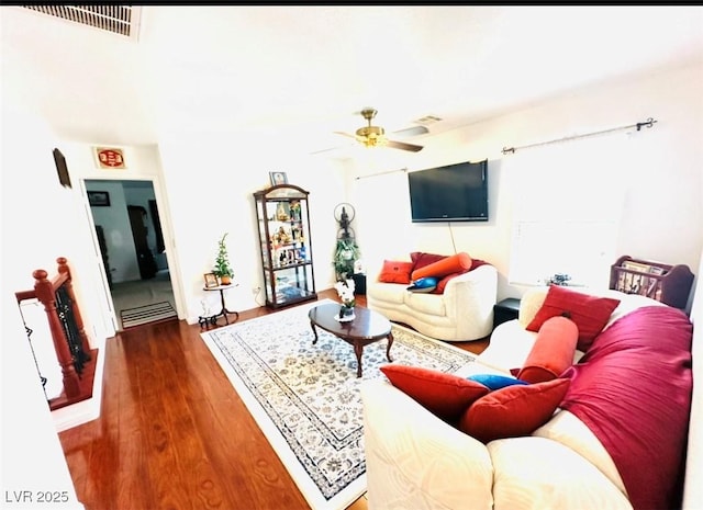 8156 Blue Hope Diamond Ln, Las Vegas, NV 89139 - living room featuring ceiling fan, wood finished floors, and healthy amount of natural light