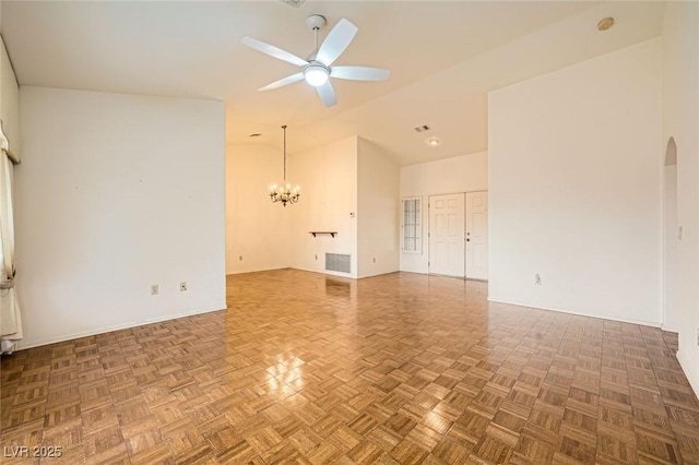 3104 Hayden Ct, Las Vegas, NV 89134 - empty room with a ceiling fan, a chandelier, arched walkways, and high vaulted ceiling