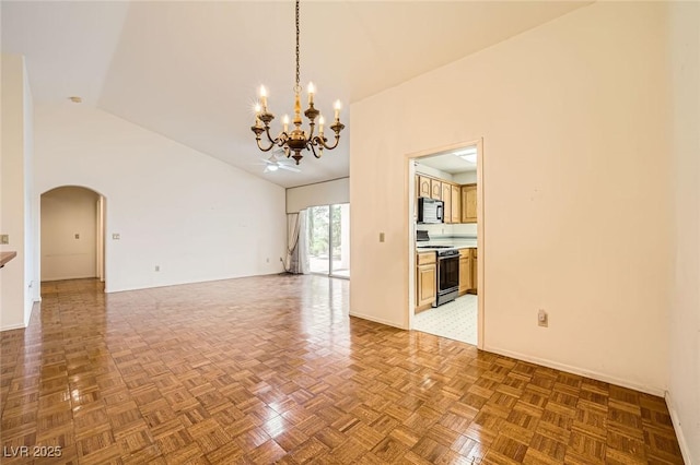 3104 Hayden Ct, Las Vegas, NV 89134 - empty room featuring a chandelier, arched walkways, and high vaulted ceiling