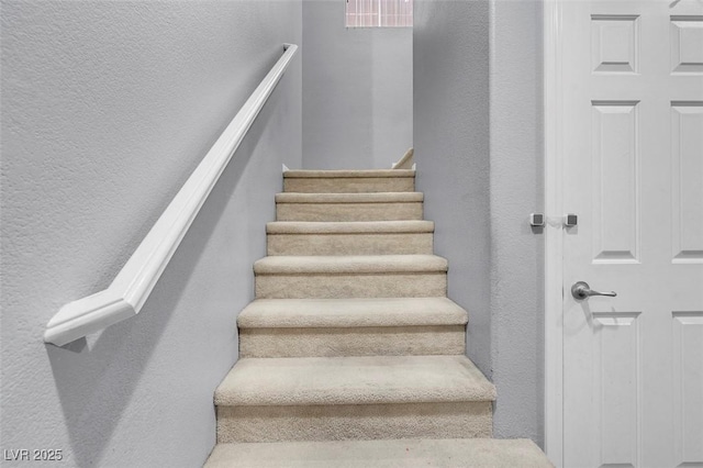 7937 Granite Walk Ave, Las Vegas, NV 89178 - staircase featuring a textured wall