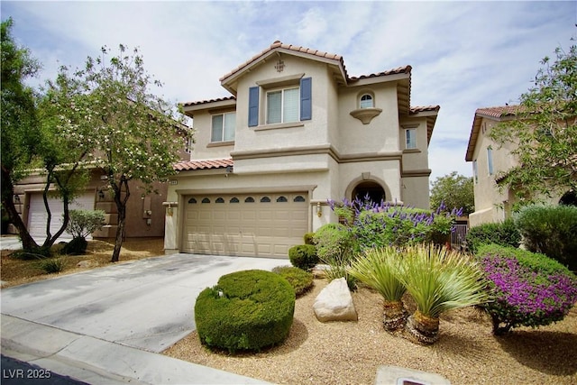 9144 Clear Sky Ave, Las Vegas, NV 89178 - mediterranean / spanish home with a tiled roof, a garage, and stucco siding