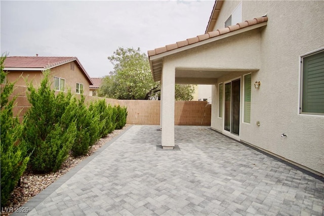 9144 Clear Sky Ave, Las Vegas, NV 89178 - fenced backyard with a patio