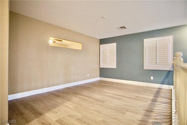 9144 Clear Sky Ave, Las Vegas, NV 89178 - empty room featuring wood finished floors and baseboards
