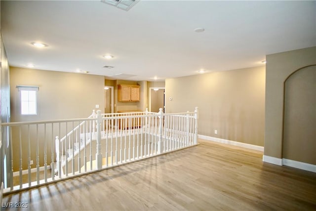 9144 Clear Sky Ave, Las Vegas, NV 89178 - spare room featuring wood finished floors, baseboards, and recessed lighting