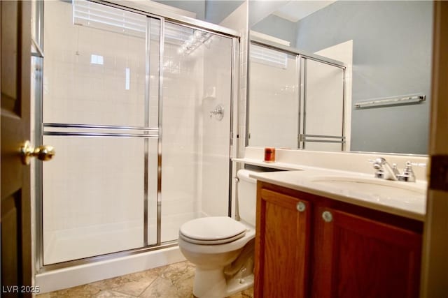 9144 Clear Sky Ave, Las Vegas, NV 89178 - bathroom featuring toilet, vanity, a stall shower, and tile patterned flooring