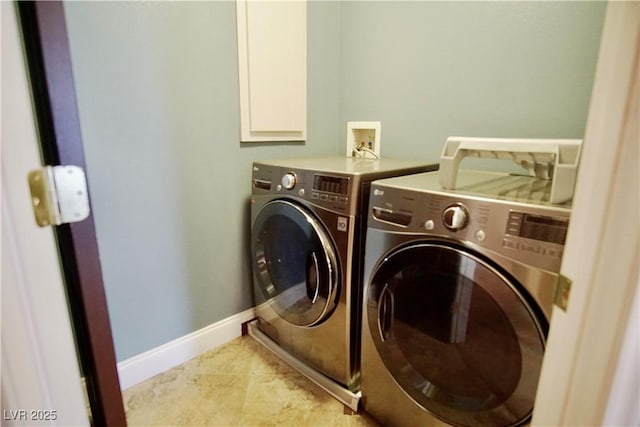 9144 Clear Sky Ave, Las Vegas, NV 89178 - laundry room featuring washing machine and clothes dryer and baseboards