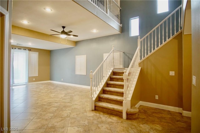 9144 Clear Sky Ave, Las Vegas, NV 89178 - stairway with ceiling fan, baseboards, and recessed lighting