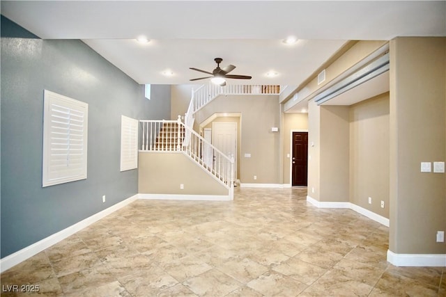 9144 Clear Sky Ave, Las Vegas, NV 89178 - unfurnished living room featuring stairway, a ceiling fan, baseboards, and recessed lighting