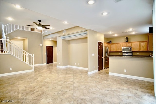 9144 Clear Sky Ave, Las Vegas, NV 89178 - unfurnished living room featuring stairs, a ceiling fan, baseboards, and recessed lighting