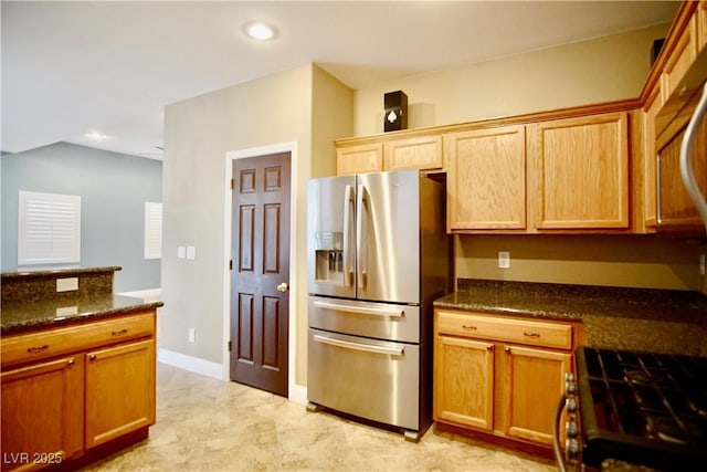 9144 Clear Sky Ave, Las Vegas, NV 89178 - kitchen with appliances with stainless steel finishes, light marble finish flooring, dark stone counters, recessed lighting, and baseboards