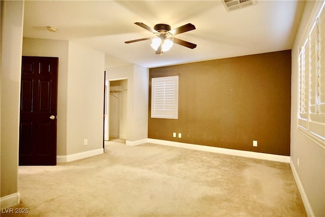 9144 Clear Sky Ave, Las Vegas, NV 89178 - unfurnished bedroom with carpet, baseboards, a closet, and ceiling fan