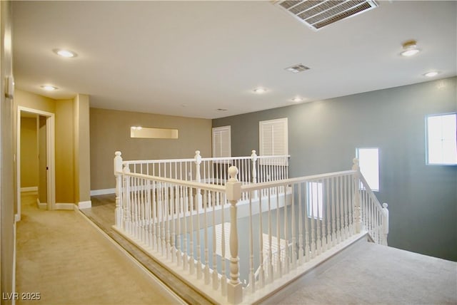 9144 Clear Sky Ave, Las Vegas, NV 89178 - hallway with an upstairs landing, carpet flooring, recessed lighting, and baseboards