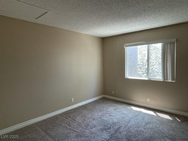 3151 Soaring Gulls Dr Unit 2147, Las Vegas, NV 89128 - carpeted spare room featuring baseboards and a textured ceiling