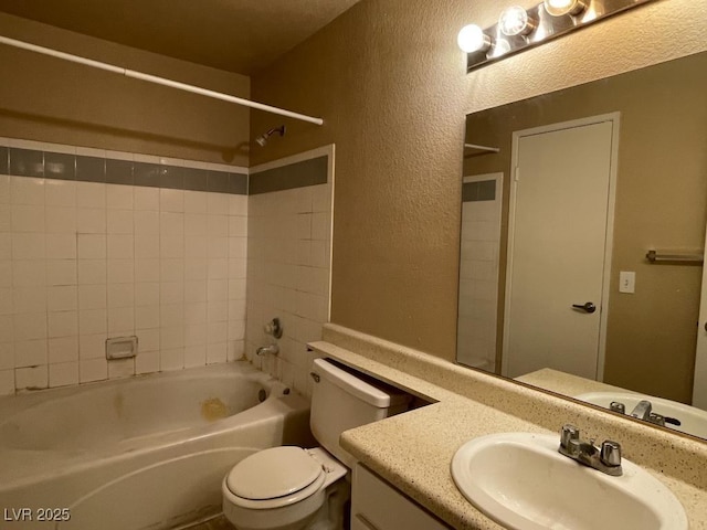 3151 Soaring Gulls Dr Unit 2147, Las Vegas, NV 89128 - full bathroom with a textured wall, toilet, vanity, and shower / bath combination