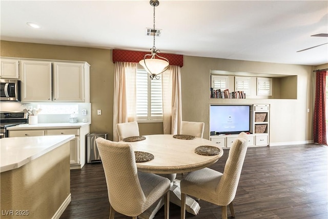 922 Lloyd George Dr, Henderson, NV 89052 - dining room featuring dark wood-style floors, ceiling fan, baseboards, and recessed lighting