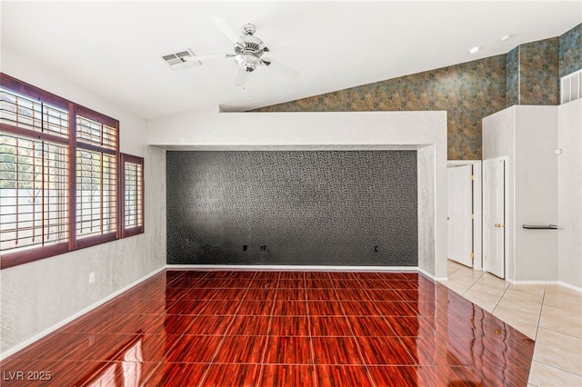 9688 Meeks Bay Ave, Las Vegas, NV 89148 - unfurnished room featuring a ceiling fan, lofted ceiling, baseboards, and tile patterned floors