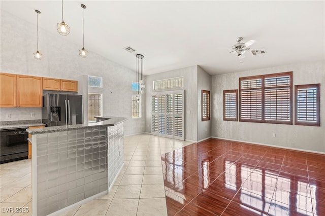 9688 Meeks Bay Ave, Las Vegas, NV 89148 - kitchen featuring stainless steel fridge, dishwasher, light tile patterned floors, a ceiling fan, and light brown cabinetry
