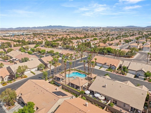 9688 Meeks Bay Ave, Las Vegas, NV 89148 - aerial view of residential area with a pool area and a mountainous background