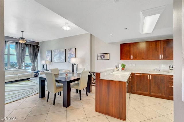 150 Las Vegas Blvd Unit 1503, Las Vegas, NV 89101 - dining room featuring light tile patterned floors and ceiling fan