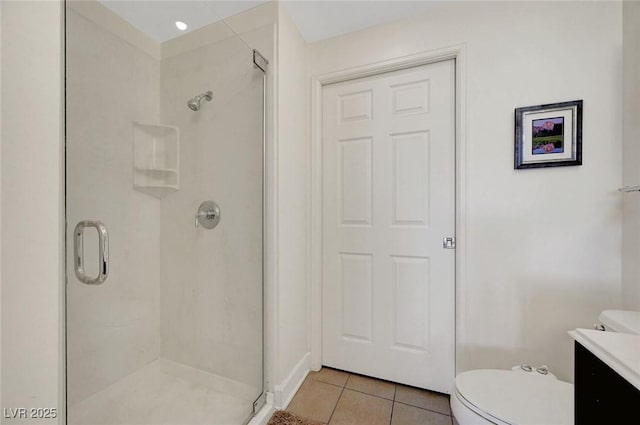 150 Las Vegas Blvd Unit 1503, Las Vegas, NV 89101 - full bathroom with a shower stall, tile patterned floors, toilet, and vanity