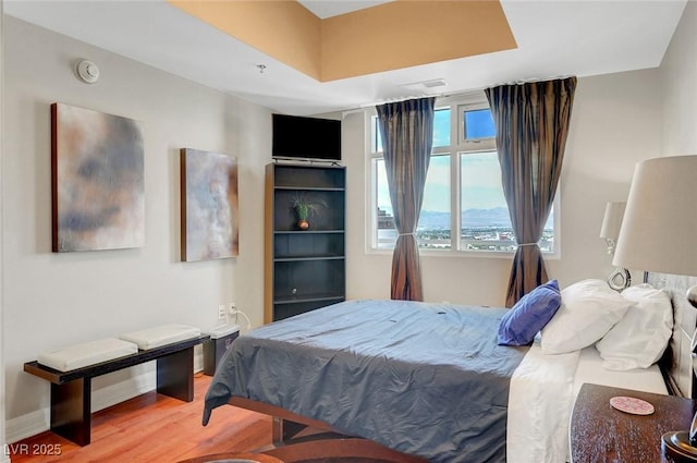 150 Las Vegas Blvd Unit 1503, Las Vegas, NV 89101 - bedroom with wood finished floors and baseboards