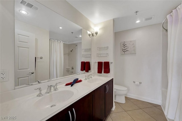 150 Las Vegas Blvd Unit 1503, Las Vegas, NV 89101 - full bathroom featuring shower / bath combo, double vanity, tile patterned flooring, toilet, and baseboards