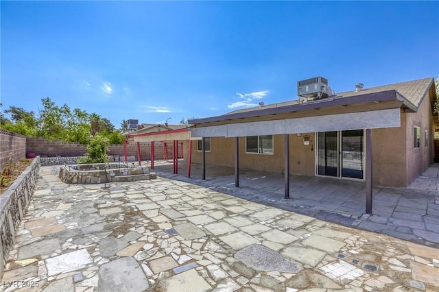 5132 Springland St, Las Vegas, NV 89146 - fenced backyard with central AC and a patio area