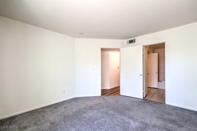 698 S Racetrack Rd Unit 1014, Henderson, NV 89015 - unfurnished bedroom featuring carpet floors and baseboards