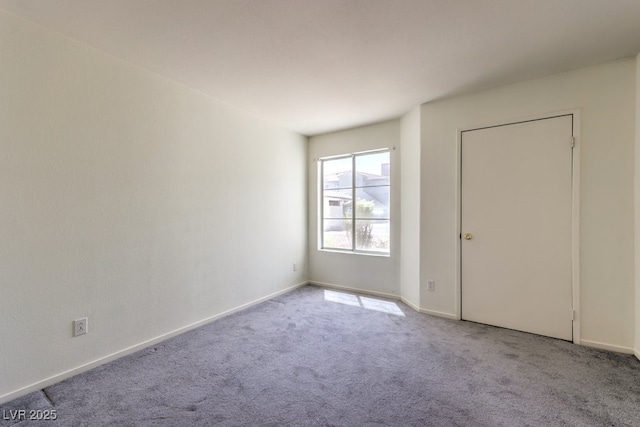 698 S Racetrack Rd Unit 1014, Henderson, NV 89015 - spare room with carpet floors and baseboards