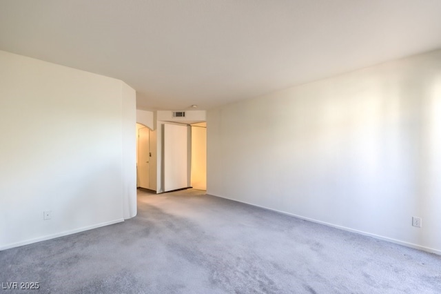 698 S Racetrack Rd Unit 1014, Henderson, NV 89015 - carpeted empty room with arched walkways and baseboards
