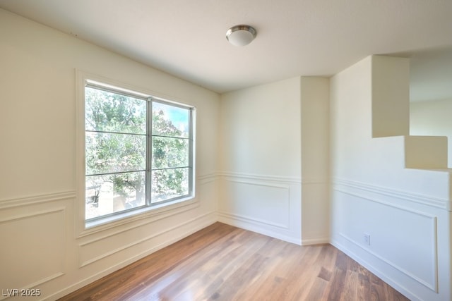 698 S Racetrack Rd Unit 1014, Henderson, NV 89015 - empty room with wood finished floors