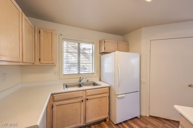 698 S Racetrack Rd Unit 1014, Henderson, NV 89015 - kitchen featuring freestanding refrigerator, light brown cabinetry, a sink, and light wood-style floors