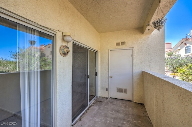 698 S Racetrack Rd Unit 1014, Henderson, NV 89015 - entrance to property with a balcony and stucco siding