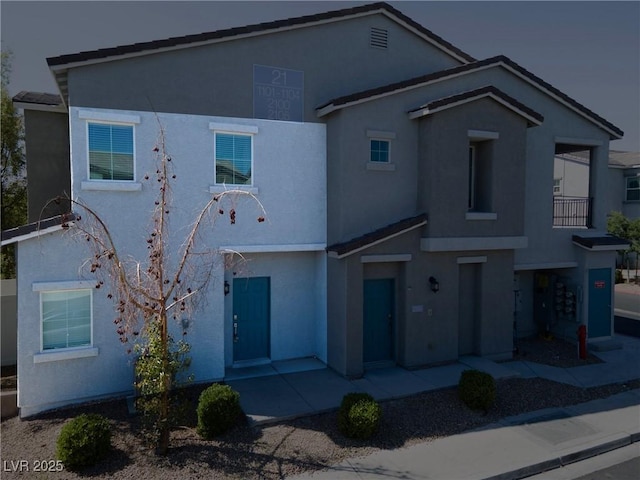 4566 Mansart Ct Unit 1104, North Las Vegas, NV 89031 - view of front of home with stucco siding