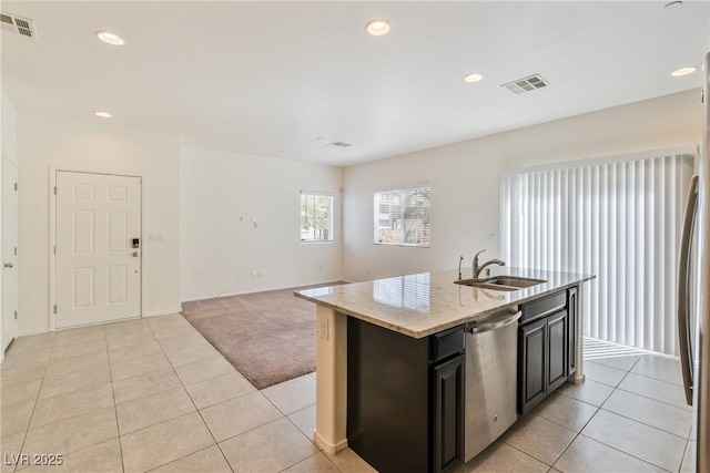 4566 Mansart Ct Unit 1104, North Las Vegas, NV 89031 - kitchen with dishwasher, a sink, light carpet, recessed lighting, and light tile patterned flooring
