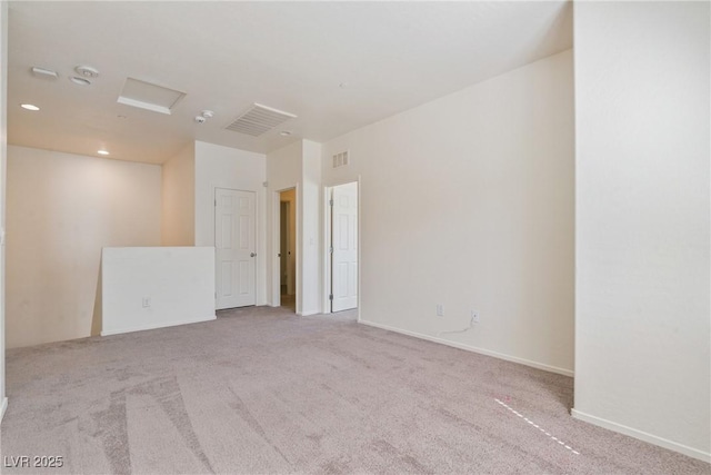 4566 Mansart Ct Unit 1104, North Las Vegas, NV 89031 - spare room featuring attic access, carpet floors, baseboards, and recessed lighting
