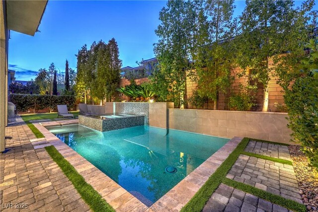 10 Sugarberry Ln, Las Vegas, NV 89135 - view of swimming pool with a fenced backyard and a patio area