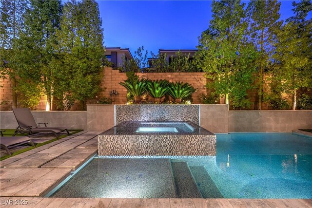 10 Sugarberry Ln, Las Vegas, NV 89135 - view of swimming pool featuring an in-ground hot tub and a patio area