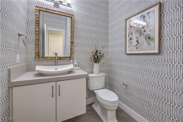 10 Sugarberry Ln, Las Vegas, NV 89135 - bathroom featuring tile walls, vanity, toilet, and tile patterned flooring