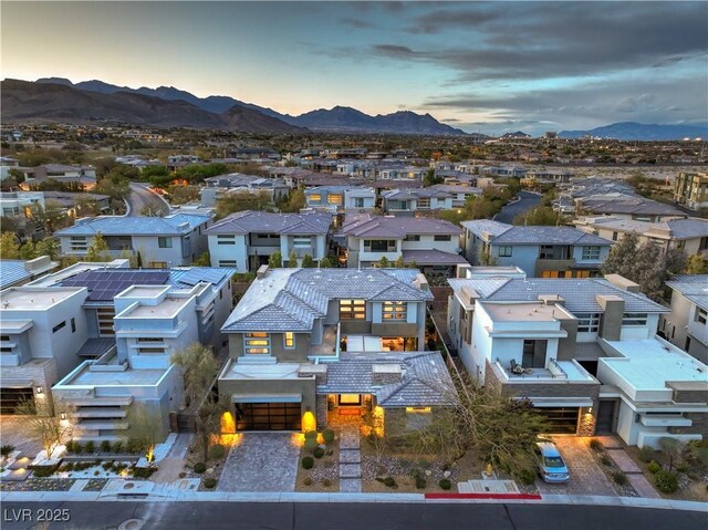 10 Sugarberry Ln, Las Vegas, NV 89135 - aerial view at dusk of a residential view and a mountain view