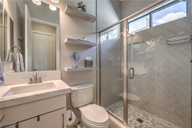10 Sugarberry Ln, Las Vegas, NV 89135 - bathroom with toilet, vanity, and a stall shower