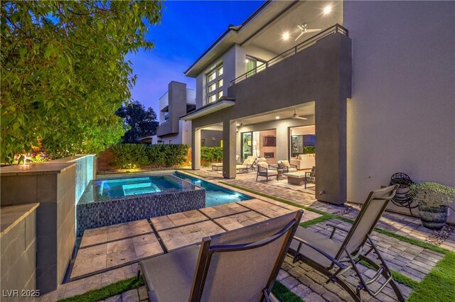10 Sugarberry Ln, Las Vegas, NV 89135 - view of swimming pool featuring an outdoor hangout area, a patio, and a ceiling fan